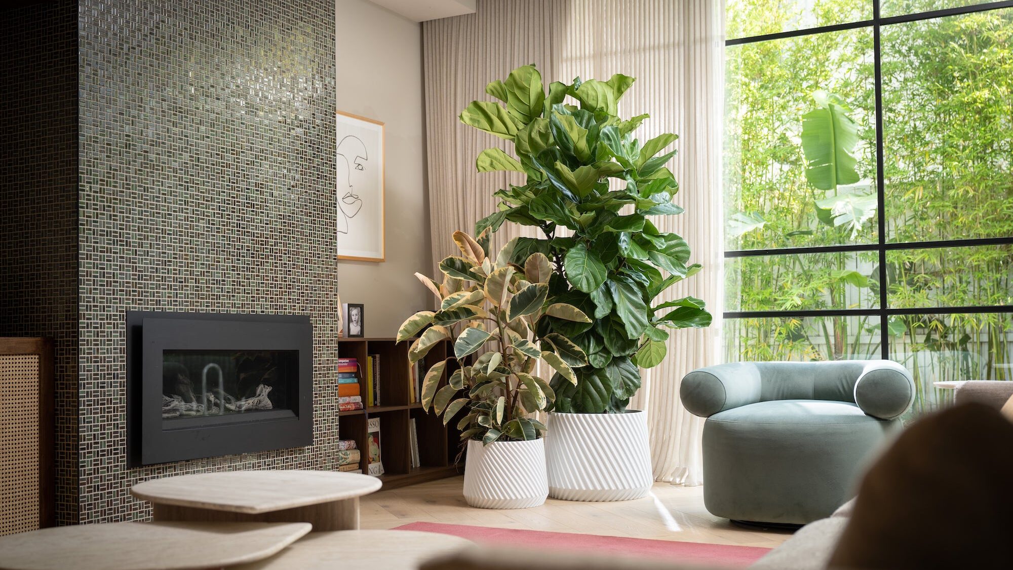 How Designer Plant Pots Can Transform Your Space 1 two white plant pots in a luxuriously furnished living room
